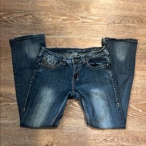 Cowgirl Tuff Blue Boot Cut Jeans with Vintage Distress